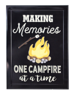 Black sign with a marshmallow roasting over a campfire and the text "Making memories one campfire at a time"