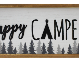Sign with text "happy campers" over trees